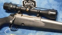 USED TIKKA MODEL 595 SYNTHETIC 243 WIN SS 22" BBL W/SCOPE