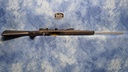 USED TIKKA MODEL 595 SYNTHETIC 243 WIN SS 22" BBL W/SCOPE