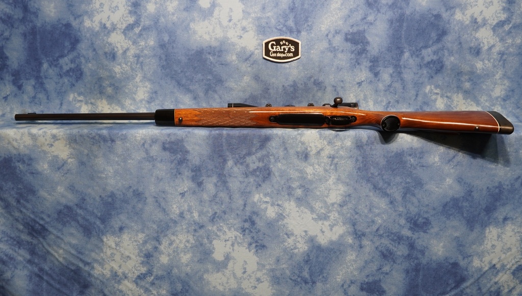 USED REMINGTON MODEL 700 BDL LEFT HAND 7MM REM MAG WITH SCOPE