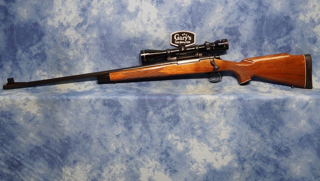 USED REMINGTON MODEL 700 BDL LEFT HAND 7MM REM MAG WITH SCOPE