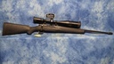 USED MOSSBERG PATRIOT 308 WIN WITH BARSKA SCOPE