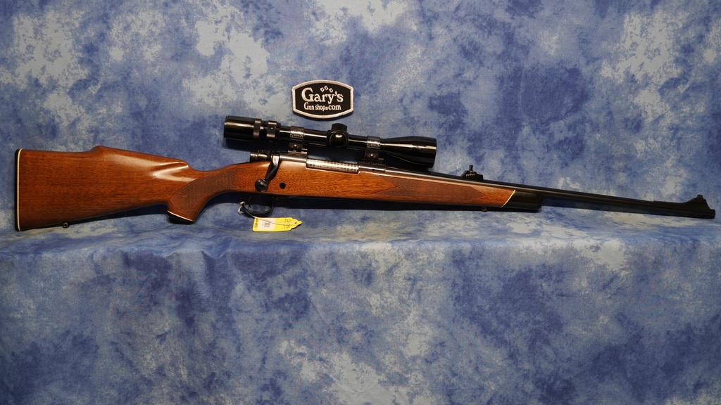 USED WINCHESTER MODEL 70 22-250 REMINGTON 22" BBL WITH BUSHNELL SCOPE