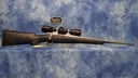 CONSIGNMENT USED REMINGTON 700 MOUNTAIN RIFLE 7MM-08 REM 22" BBL W/ REDFIELD REVOLUTION 4-12X40 SCOPE