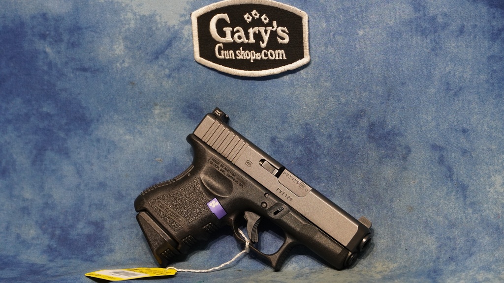 USED GLOCK G27 40 S&W WITH 9MM BBL AND MAGS