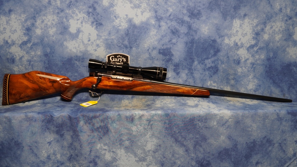 CONSIGNMENT WEATHERBY MARK V 300 WBY MAG W/ LEUPOLD SCOPE W. GERMAN